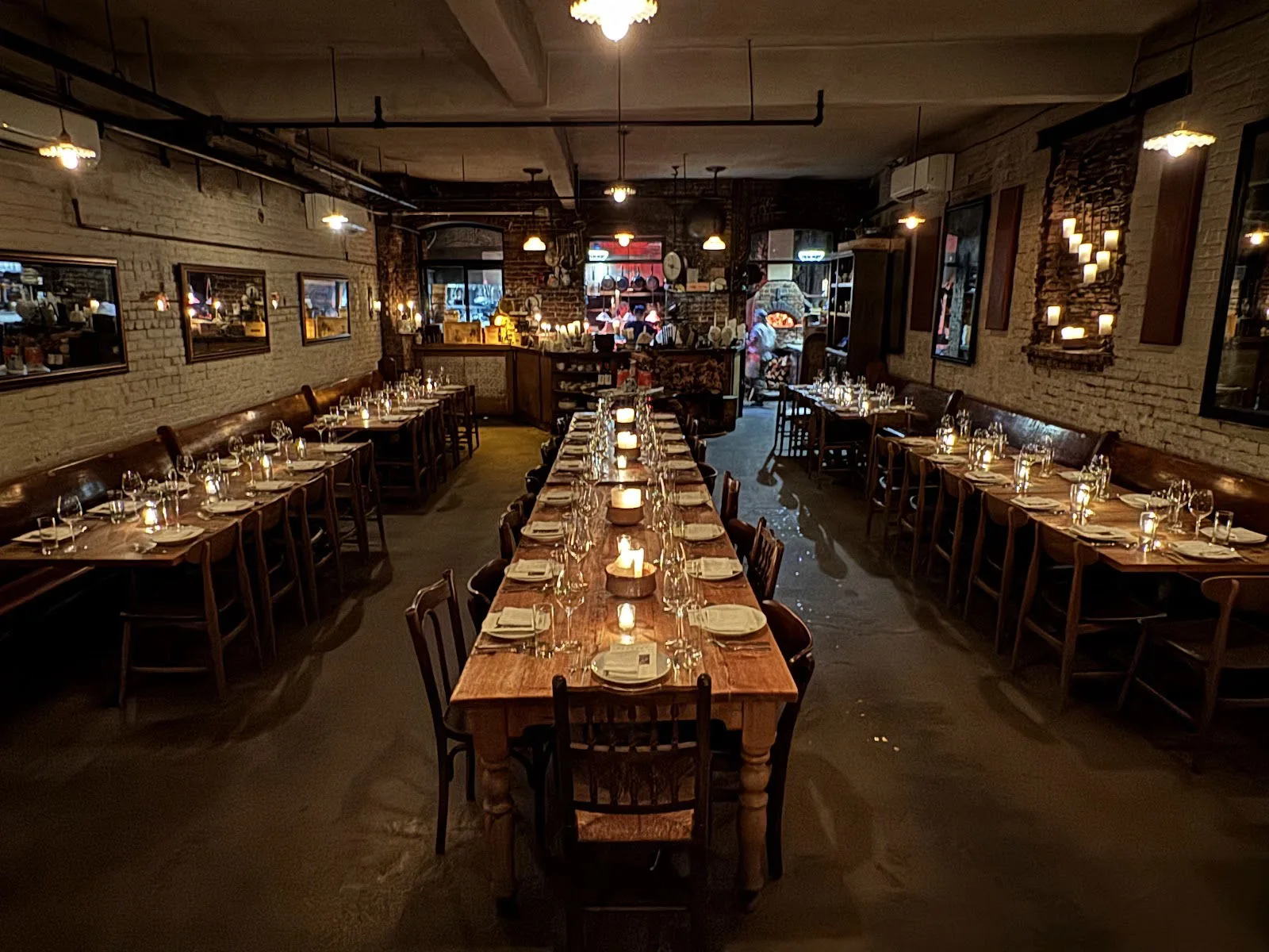 The long candlelit dining room at Peasant